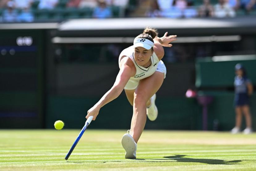 Czech Republic's Linda Noskova returns to US player Madison Keys during their women's singles round of 16 tennis match on the eighth day of the 2026 Wimbledon Championships at The All England Lawn Tennis and Croquet Club in Wimbledon, southwest London, on July 6, 2026.  Kirill KUDRYAVTSEV / AFP