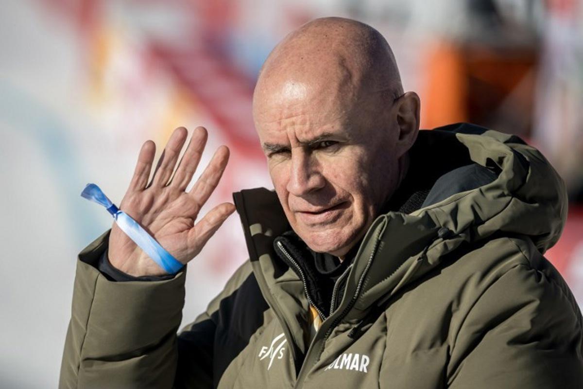 FIS President Johan Eliasch waves at the end of the FIS Alpine Ski World Cup 2025-2026, in St Moritz, south-eastern Switzerland on December 13, 2025.  Fabrice COFFRINI / AFP