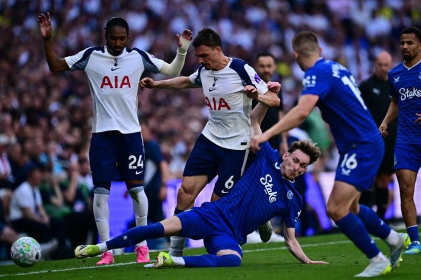 Everton's English midfielder #37 James Garner (2R) vies with Tottenham Hotspur's Portugese midfielder #06 Joao Palhinha (2L) during the English Premier League football match between Tottenham Hotspur and Everton at the Tottenham Hotspur Stadium in London, on May 24, 2026.  Ben STANSALL / AFP