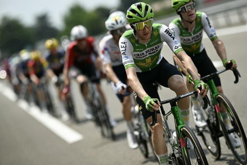 Caja Rural - Seguros RGA team's Spanish rider Abel Balderstone cycles with the pack of riders (peloton) during the 7th stage of the 113th edition of the Tour de France cycling race, 175,1 km between Hagetmau and Bordeaux in southwestern France, on July 10, 2026.  Loic VENANCE / AFP