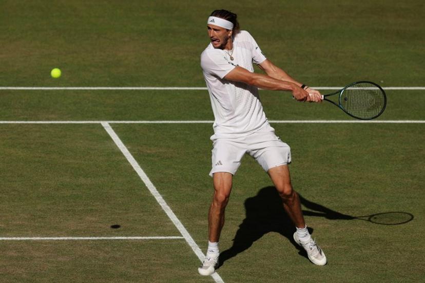 Germany's Alexander Zverev returns to Italy's Jannik Sinner during their men's singles final tennis match on the fourteenth day of the 2026 Wimbledon Championships at The All England Lawn Tennis and Croquet Club in Wimbledon, southwest London, on July 12, 2026.  Adrian Dennis / AFP