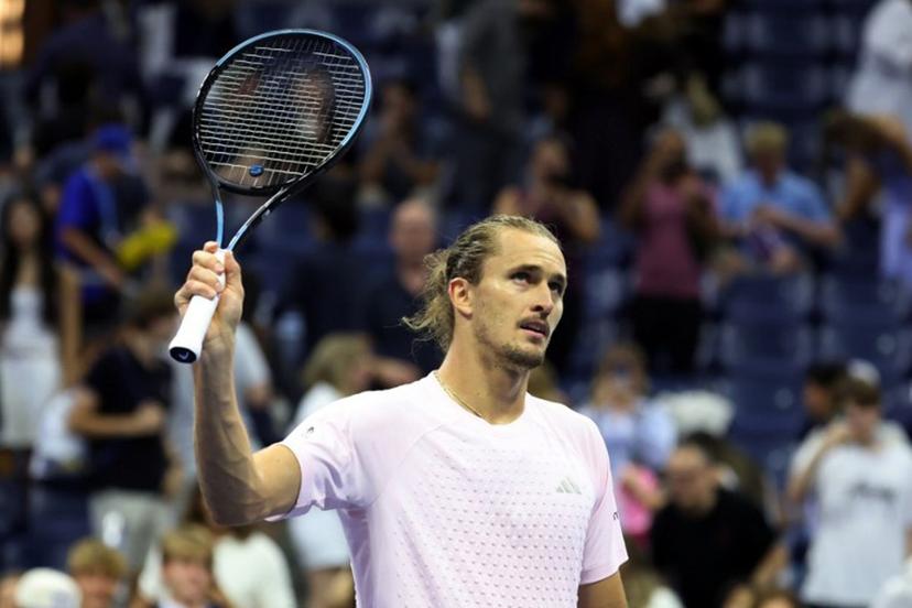 Germany's Alexander Zverev waves his racquet to the crowd after defeating Chile's Alejandro Tabilo during their men's singles third-round tennis match on day seven of the US Open tennis tournament at the USTA Billie Jean King National Tennis Center in New York City in the early hours of September 6, 2026.  Leonardo MUNOZ / AFP