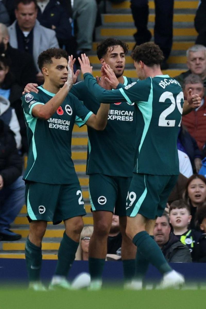 Brighton's Swedish midfielder #26 Yasin Ayari (L) celebrates scoring the team's first goal during the English Premier League football match between Manchester City and Brighton and Hove Albion at the Etihad Stadium in Manchester, north west England, on October 31, 2026.  Darren Staples / AFP