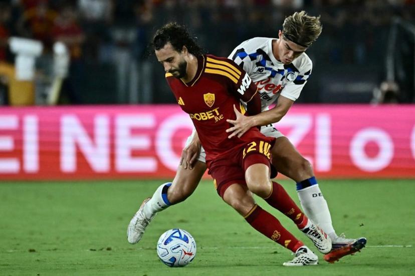 Roma's Spanish midfielder #22 Mario Hermoso (R) vies with Atalanta's Belgian forward #17  Charles De Ketelaere (R) during the Italian Serie A football match between Roma and Atalanta at the Olympic Stadium in Rome on September 5 2026.  Filippo MONTEFORTE / AFP
