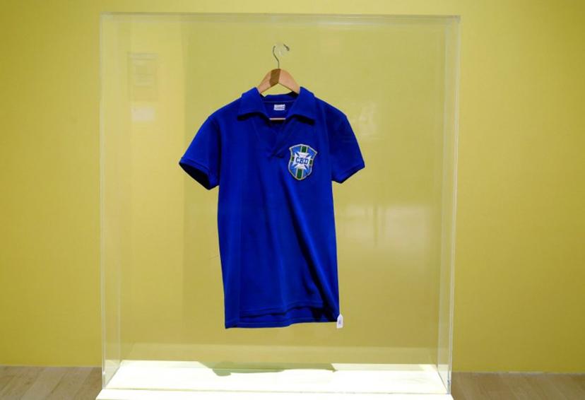 The jersey worn by Brazilian football legend Pele during the 1958 FIFA World Cup final match against Sweden is exhibited during a press preview at the Sotheby's Breuer building in New York, on July 1, 2026. The shirt will be put to auction as part of the "Summer Season at the Breuer" from late June through mid-August 2026. TIMOTHY A. CLARY / AFP