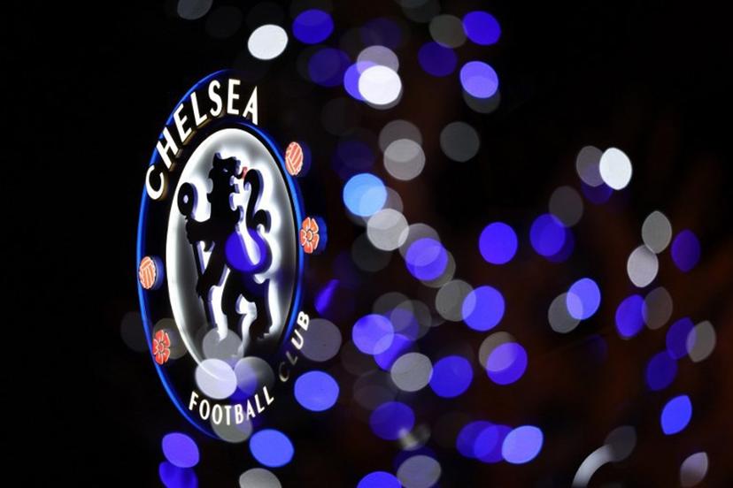 The Chelsea logo is seen through Christmas decorations ahead of the English Premier League football match between Chelsea and Bournemouth at Stamford Bridge in London on December 30, 2025.  Adrian Dennis / AFP