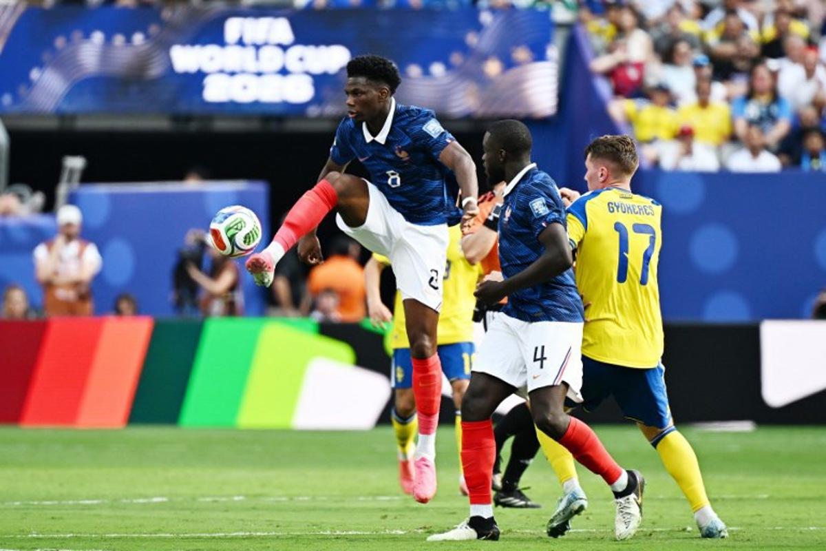 France's midfielder #08 Aurelien Tchouameni controls the ball during the 2026 World Cup round of 32 football match between France and Sweden at the New York/New Jersey Stadium in East Rutherford on June 30, 2026.   Jewel SAMAD / AFP