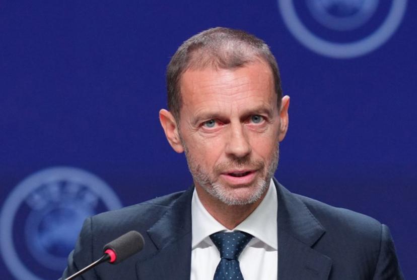 UEFA president Aleksander Ceferin addresses a press conference at the 50th UEFA Ordinary Congress in Brussels on February 12, 2026.   Pau BARRENA / AFP