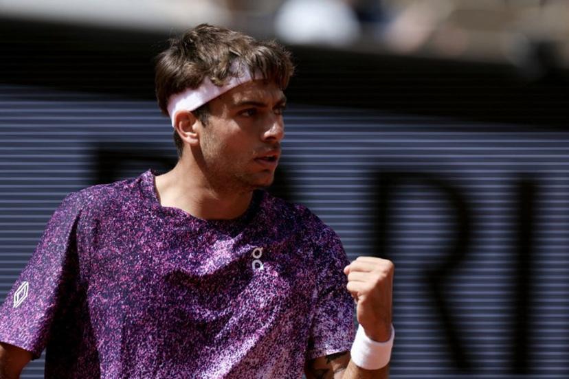 Italy's Flavio Cobolli reacts after a point as he plays against US Zachary Svajda during their men's singles match on day 9 of the French Open tennis tournament on Court Philippe-Chatrier at the Roland-Garros Complex in Paris on June 1, 2026.  ALAIN JOCARD / AFP