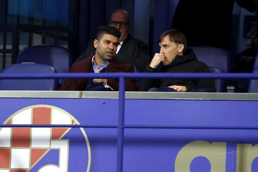 Croatian former football players Eduardo da SIlva (L) and Dario Simic speak during the UEFA Champions League, league phase - day 8 football match between GNK Dinamo Zagreb and AC Milan at Maksimir Stadium in Zagreb on January 29, 2025.  Damir SENCAR / AFP