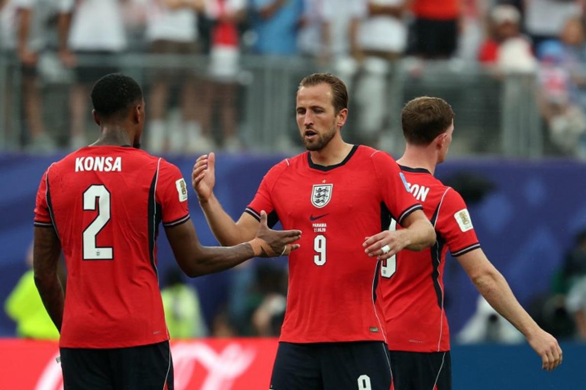 England's forward #09 Harry Kane greets England's defender #02 Ezri Konsa at the end of the 2026 World Cup Group L football match between Panama and England at the New York/New Jersey Stadium in East Rutherford on June 27, 2026.   FRANCK FIFE / AFP