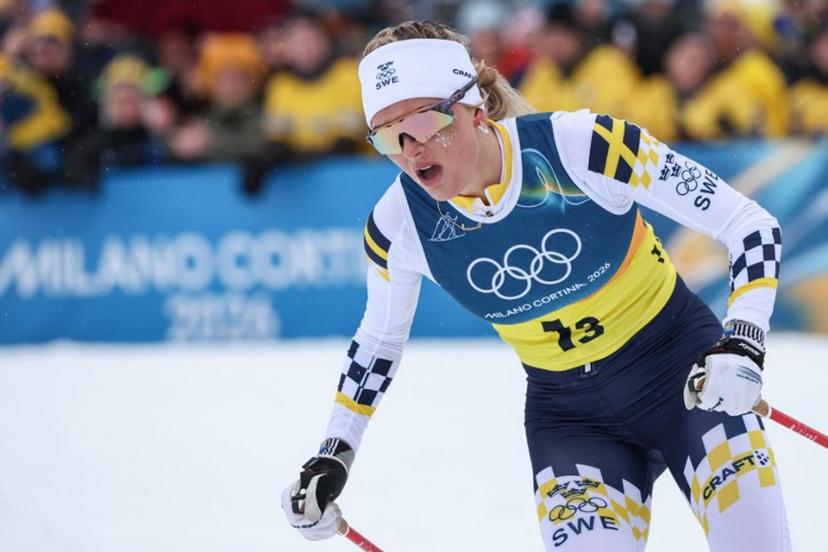 Sweden's Frida Karlsson competes during the cross-country women's 4 x 7,5km relay event of the Milano Cortina 2026 Winter Olympic Games at Tesero Cross-Country Skiing Stadium in Lago di Tesero (Val di Fiemme), on February 14, 2026.  Anne-Christine POUJOULAT / AFP