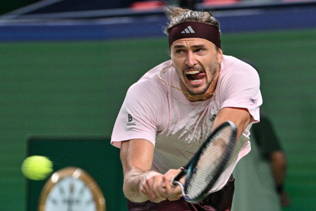 Germany's Alexander Zverev hits a return to Kazakhstan's Alexander Bublik during their men's singles match at the Shanghai Masters tennis tournament in Shanghai on October 13, 2026.  Hector RETAMAL / AFP
