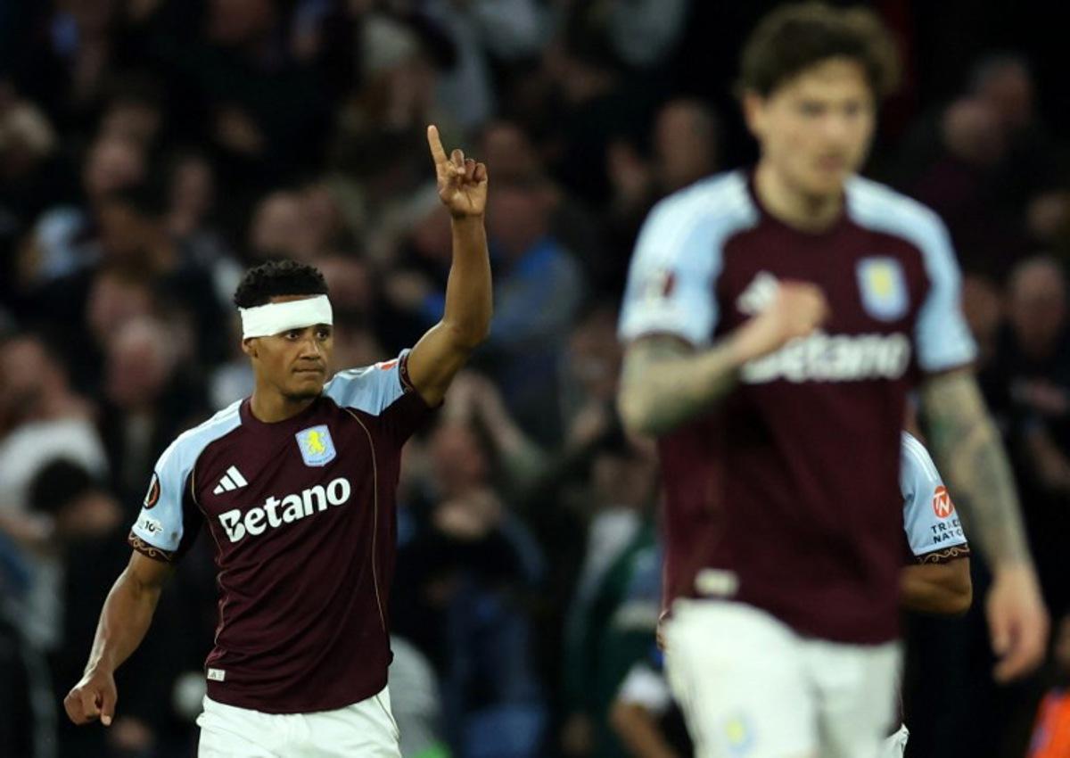 Aston Villa's English striker #11 Ollie Watkins celebrates scoring the opening goal during the UEFA Europa League, semi-final second-leg football match between Aston Villa and Nottingham Forest at Villa Park in Birmingham, central England on May 7, 2026.  Darren Staples / AFP