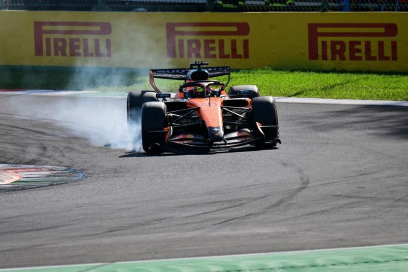smoke billows from the car of McLaren's Australian driver Oscar Piastri during the qualifying session of the Italian Formula One Grand Prix at the Autodromo Nazionale Monza circuit in Monza, northern Italy on September 5, 2026.  Andrej ISAKOVIC / AFP