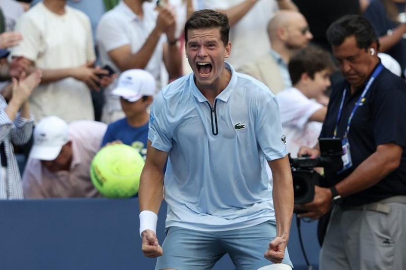 Belgium's Alexander Blockx celebrates defeating Italy's Flavio Cobolli during at the end of their men's singles third round tennis match on day seven of the US Open tennis tournament at the USTA Billie Jean King National Tennis Center in New York City on September 5, 2026.  TIMOTHY A. CLARY / AFP