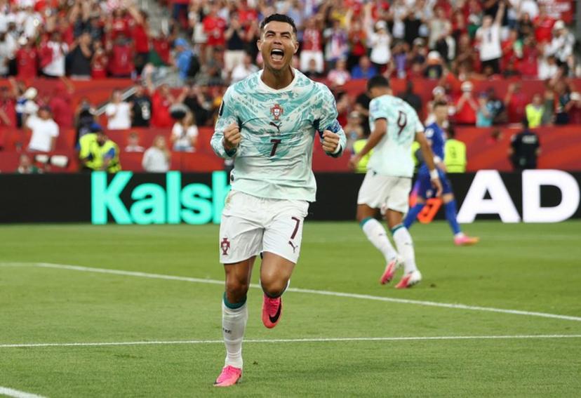 Portugal's forward #07 Cristiano Ronaldo celebrates after scoring his team's first goal from the penalty spot during the 2026 World Cup round of 32 football match between Portugal and Croatia at the Toronto Stadium in Toronto on July 2, 2026.   Cole Burston / AFP