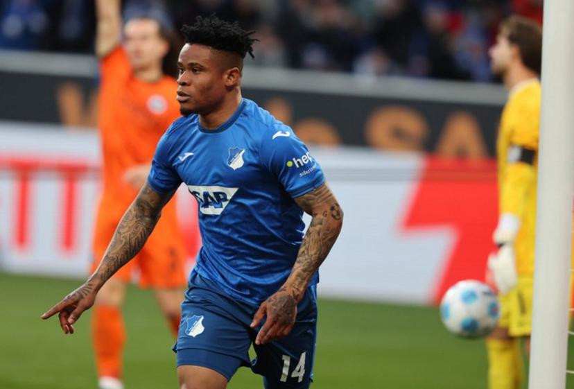 Hoffenheim's Nigerian forward #14 Gift Orban celebrates scoring during the German first division Bundesliga football match between TSG Hoffenheim and Eintracht Frankfurt in Sinsheim on January 26, 2025.  Daniel ROLAND / AFP