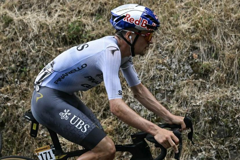 Pinarello Q36.5 Pro Cycling Team's British rider Tom Pidcock cycles during the 14th stage of the 113th edition of the Tour de France cycling race, 155,3 km between Mulhouse and Le Markstein in the Vosges mountains, on July 18, 2026.  Loic VENANCE / AFP