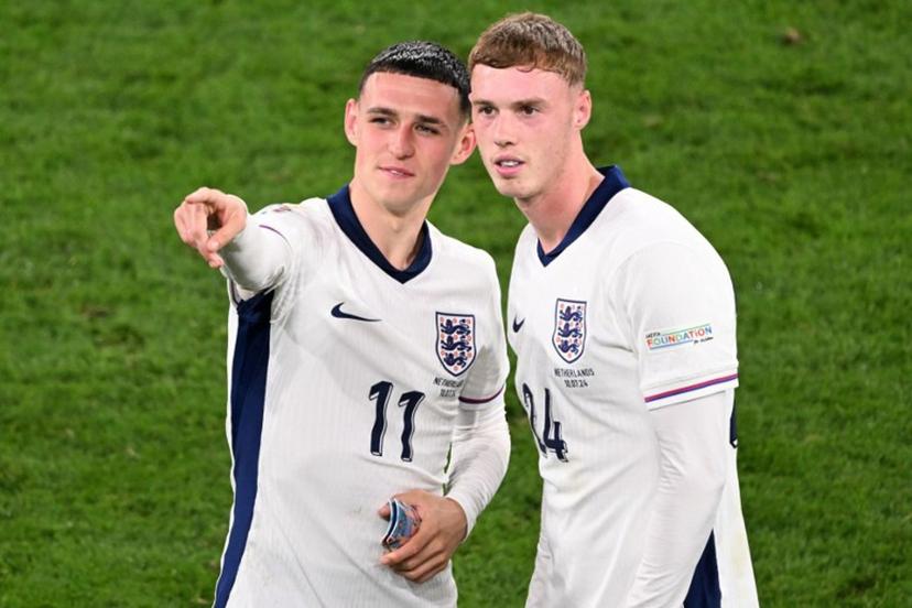 England's midfielder #11 Phil Foden and England's midfielder #24 Cole Palmer celebrate at the end of the UEFA Euro 2024 semi-final football match between the Netherlands and England at the BVB Stadion in Dortmund on July 10, 2024.  Kirill KUDRYAVTSEV / AFP