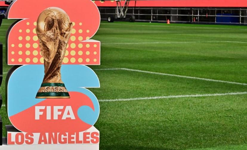 The official logo for Los Angeles as host of a number of matches for the 2026 World Cup as the new test pitch at Sofi Stadium is revealed to the media in Inglewood, California on March 13, 2025. The pitch will be used for the upcoming Concacaf Nations League semifinals on March 20 when the US play Panama and Canada plays Mexico.  Frederic J. BROWN / AFP