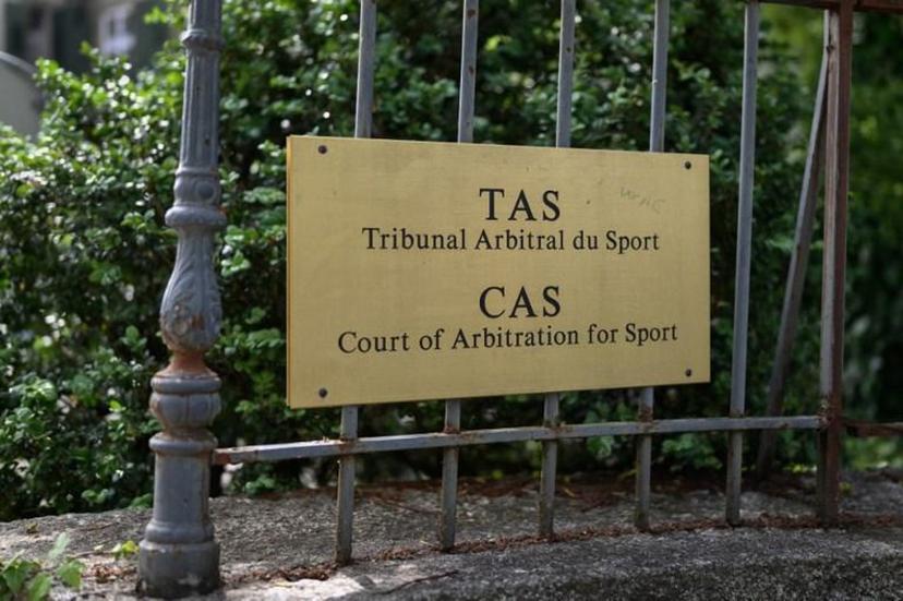 A picture taken on June 8, 2020 shows a sign at the entrance of the Court of Arbitration for Sport (CAS or TAS for Tribunal Arbitral du Sport) in Lausanne on the opening day of an appeal by football club Manchester City against a two-year ban from European competition, accused of overstating sponsorship revenue to hide that they had not complied with UEFA's financial fair play (FFP) rules.  Fabrice COFFRINI / AFP