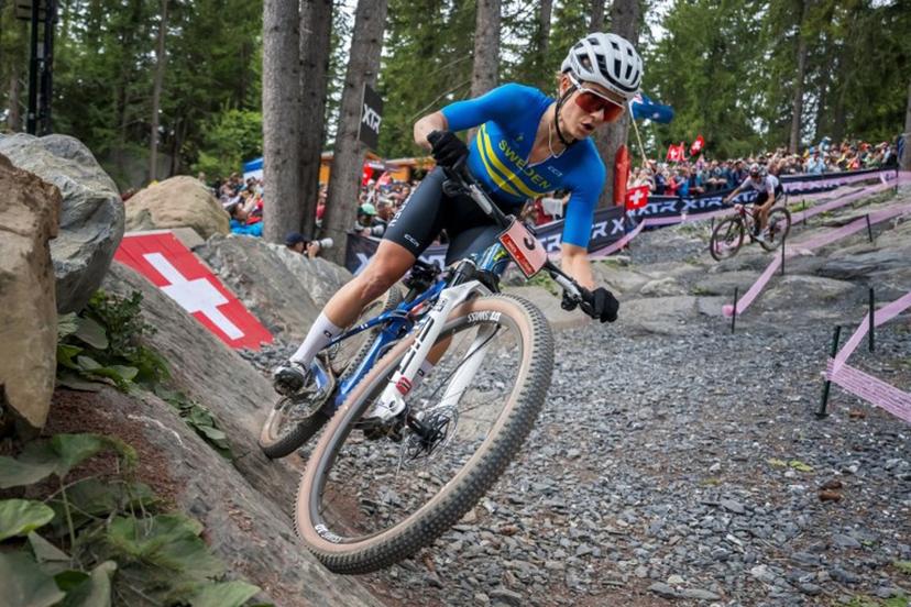 Sweden's Jenny Rissveds competes in the Women's elite Cross-country Olympic race as part of the 2025 UCI Mountain Bike World Championships in Crans-Montana on September 13, 2025.  Fabrice COFFRINI / AFP