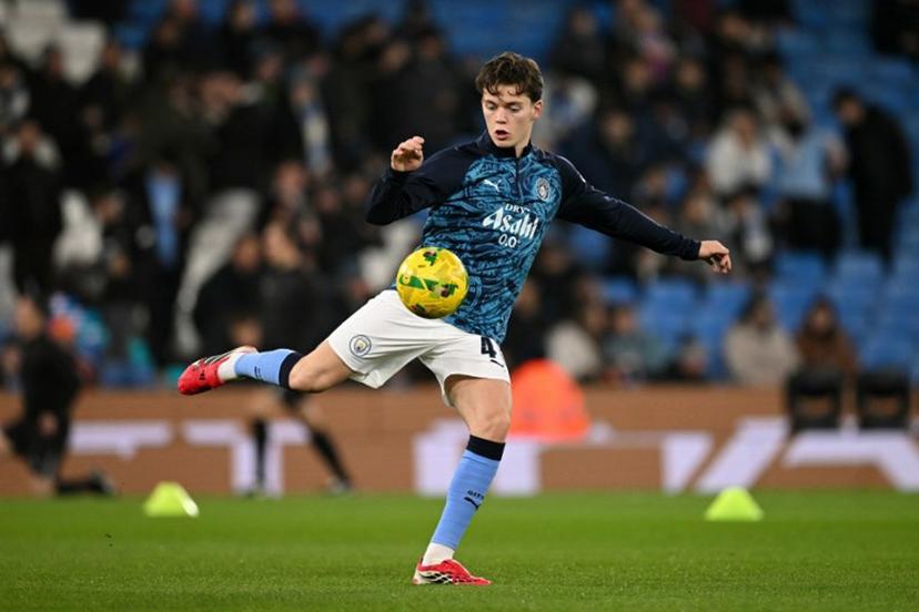Manchester City's Norwegian midfielder #41 Sverre Nypan warms up ahead of the English League Cup semi final second leg football match between Manchester City and Newcastle United at the Etihad stadium in Manchester, northwest England on February 4, 2026.  Oli SCARFF / AFP