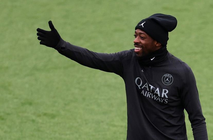 Paris Saint-Germain's French forward #10 Ousmane Dembele gestures during a training session at the Campus Paris Saint-Germain in Poissy, in the western outskirts of Paris, on November 25, 2025, on the eve of the UEFA Champions League first round day 5 football match between Paris Saint-Germain and Tottenham Hotspur.   FRANCK FIFE / AFP