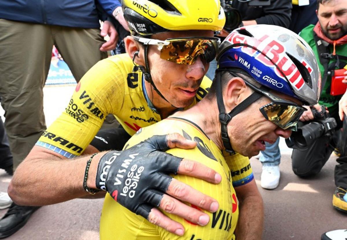 Team Visma - Lease a Bike's French rider Christophe Laporte (L) congratulates winner Team Visma - Lease a Bike's Belgian rider Wout van Aert at the end of the 123rd edition of the Paris-Roubaix one-day classic cycling race, 258.3 km between Compiègne and Roubaix, at the Vélodrome André-Pétrieux in Roubaix, northern France, on April 12, 2026.  Etienne GARNIER / POOL / AFP