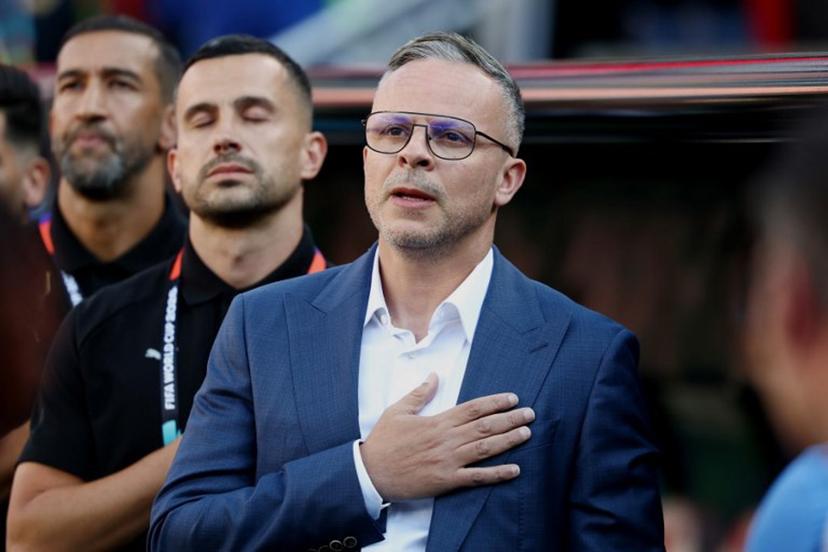 Morocco's head coach Mohamed Ouahbi listens his national anthem the 2026 World Cup Group C football match between Scotland and Morocco at the Boston Stadium in Foxborough on June 19, 2026.   FRANCK FIFE / AFP