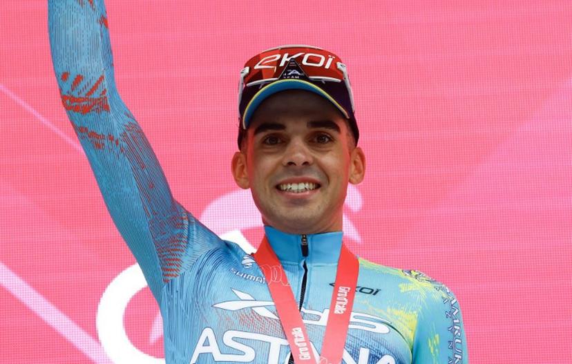 XDS Astana Team Uruguayan rider Guillermo Silva celebrates on the podium after winning the 2nd stage of the Giro d'Italia 2026 - Tour of Italy cycling race between Burgas and Veliko Tarnovo, Bulgaria, on May 9, 2026.  Luca Bettini / AFP