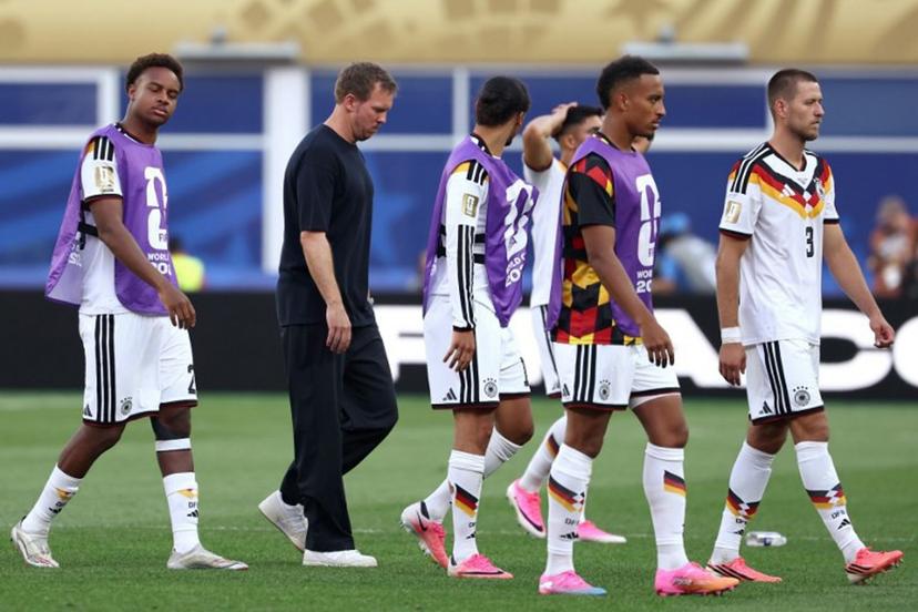Germany's head coach Julian Nagelsmann (2nd L) reacts after losing the penalty shootout during the 2026 World Cup round of 32 football match between Germany and Paraguay at the Boston Stadium in Foxborough on June 29, 2026.   FRANCK FIFE / AFP