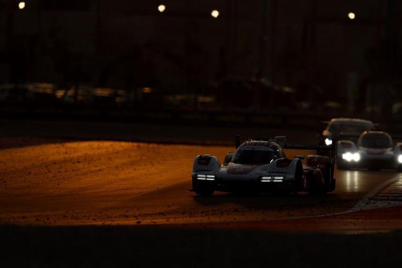 The #06 (front) Porsche Penske Motorsport, Porsche 963 of Kevin Estre, Andre Lotterer, and Laurens Vanthoor takes part in the final day of racing action in the FIA World Endurance Championship 2024 at Lusail International Circuit on March 2, 2024 in Doha, Qatar.  KARIM JAAFAR / AFP