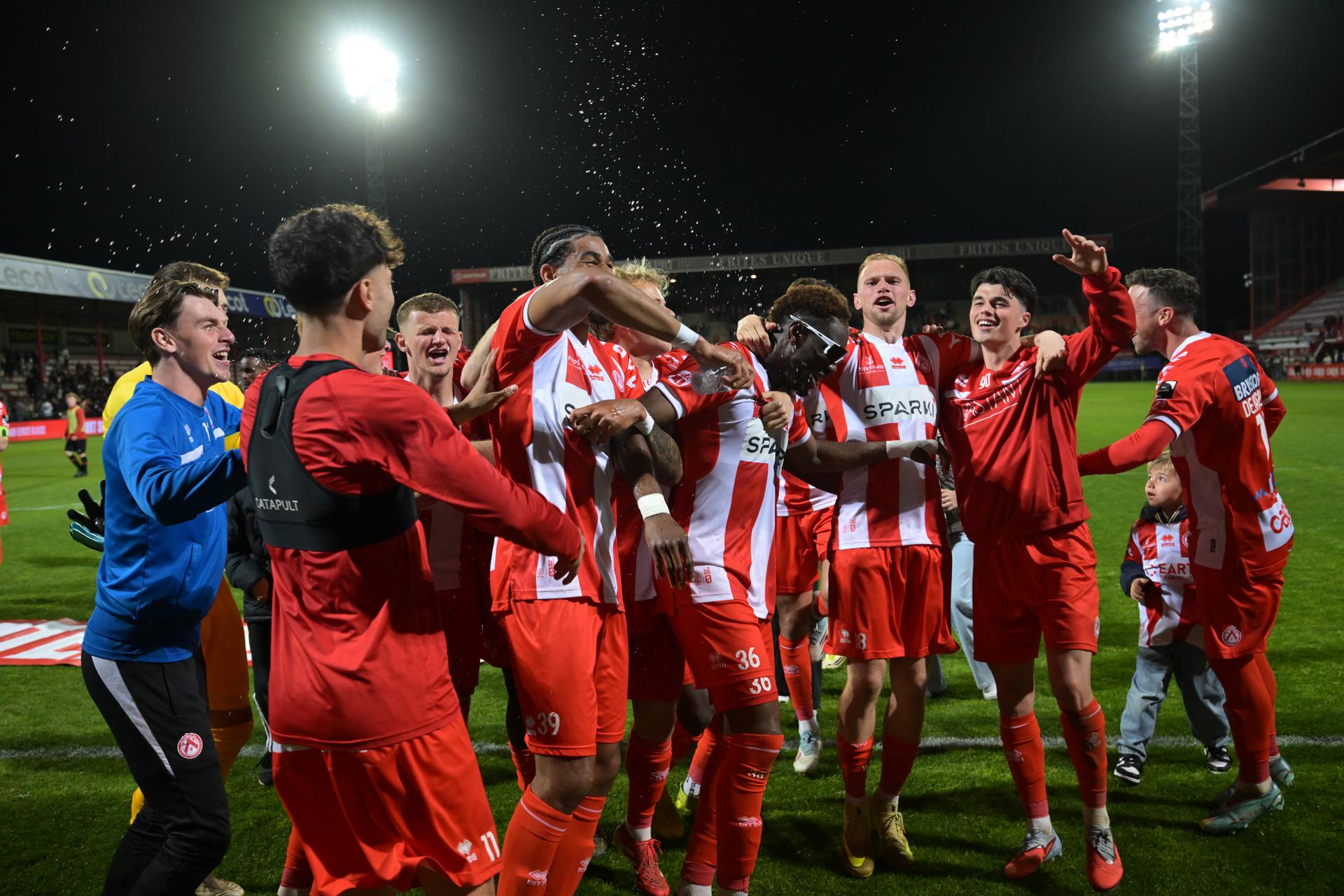Kortrijk's players celebrates after winning a soccer game between KV Kortrijk and RWDM Brussels, Friday 17 April 2026 in Kortrijk, on day 34 of the 2025-2026 'Challenger Pro League' 1B second division of the Belgian championship. BELGA PHOTO DAVID PINTENS