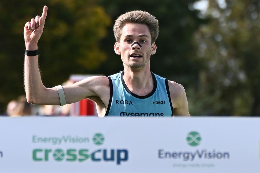 Belgian Yorick Van De Kerkhove celebrates as he crosses the finish line to win the men's race at the CrossCup cross country running athletics event in Roeselare on Sunday 25 October 2026.  BELGA PHOTO ELIAS ROM