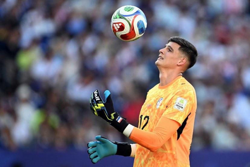 Paraguay's goalkeeper #12 Orlando Gill controls the ball during the 2026 World Cup round of 16 football match between Paraguay and France at the Philadelphia Stadium in Philadelphia on July 4, 2026.   MAURO PIMENTEL / AFP