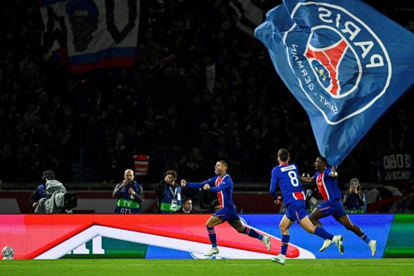 PSG's French defender #21 Lucas Hernandez (L) celebrates after scoring his team's second goal during the UEFA Champions League first round day 3 football match between Paris Saint-Germain (PSG) and FC Barcelona at the Parc de Princes stadium in Paris on October 20, 2026.  JULIEN DE ROSA / AFP