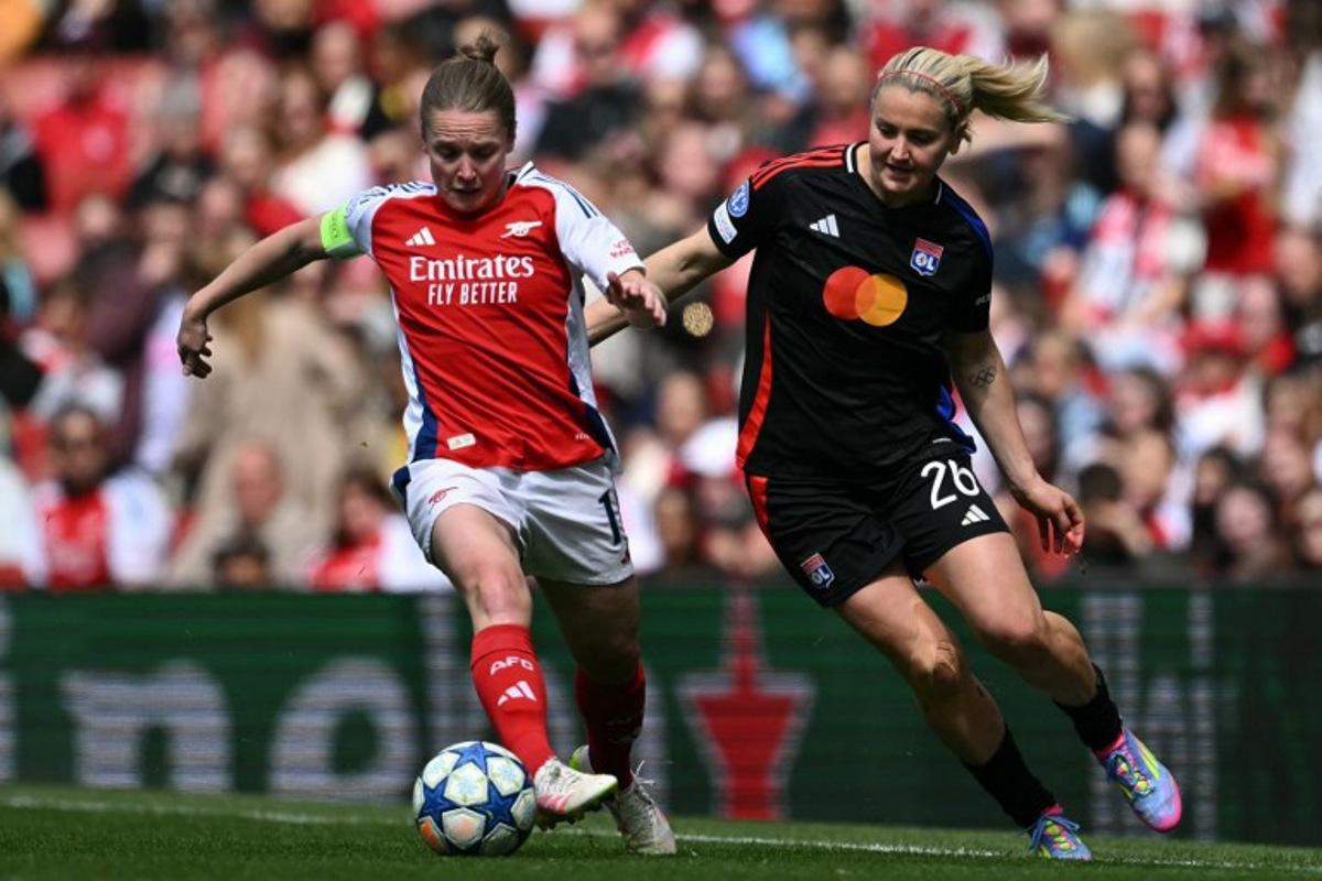 Arsenal's Scottish midfielder #10 Kim Little (L) vies with Lyon's US midfielder #26 Lindsey Heaps (R) during the UEFA Women's Champions League semi-final first leg football match between Arsenal and Lyon, at the Arsenal Stadium in north London on April 19, 2025.  JUSTIN TALLIS / AFP