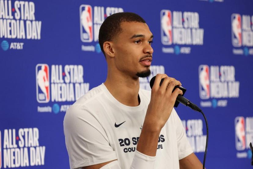 French basketball player Victor Wembanyama of the San Antonio Spurs speaks to the media during the NBA All-Star media day at the Intuit Dome in Inglewood, California, on February 14, 2026.  Patrick T. Fallon / AFP