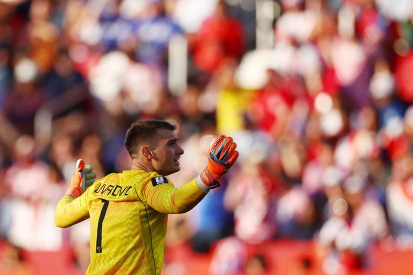Croatia's goalkeeper #01 Dominik Livakovic gestures during the 2026 World Cup Group L football match between Panama and Croatia at the Toronto Stadium in Toronto on June 23, 2026.   Cole Burston / AFP