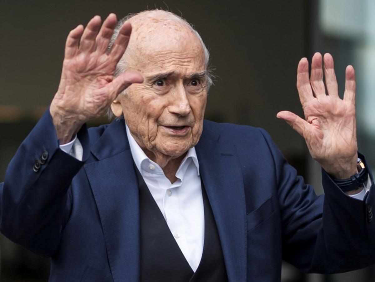 Former FIFA president Sepp Blatter reacts as he leaves the courthouse after the verdict of an appeal by Swiss Attorney General's office against former UEFA and FIFA presidents over a suspected fraudulent payment, in Muttenz near Basel, on March 25, 2025. Former FIFA president Sepp Blatter and ex-UEFA chief Michel Platini were acquitted again  on March 25, 2025 on appeal by a Swiss court in a long-running corruption case. Fabrice COFFRINI / AFP