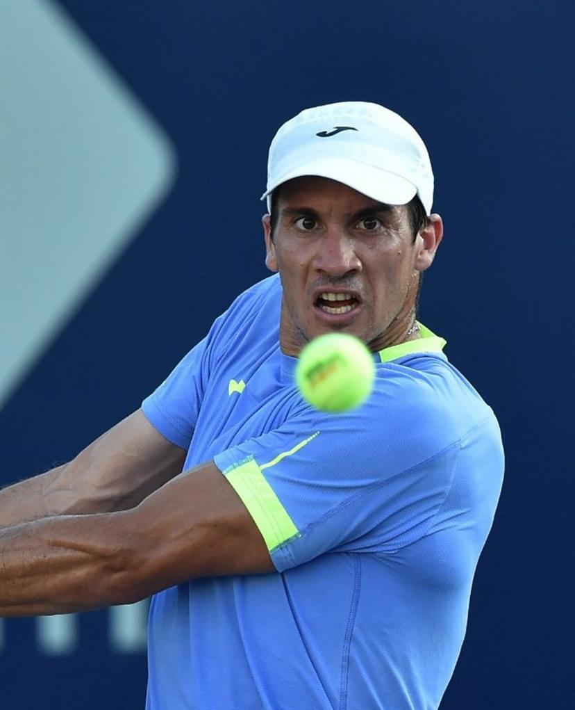 Argentine Facundo Bagnis returns the ball against US' Ernesto Escobedo during their Mexico ATP Open 250 men's singles tennis match at the Cabo Sports Complex in Los Cabos, Mexico, on August 2, 2022.  RODRIGO ARANGUA / AFP