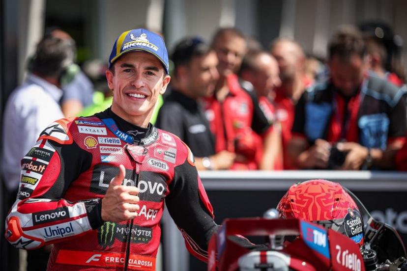 Ducati Lenovo Team's Spanish MotoGP rider Marc Marquez reacts after winning the qualifiying session of the German Motorcycle MotoGP Grand Prix at the Sachsenring race track in Hohenstein-Ernstthal near Chemnitz, eastern Germany, on July 11, 2026.  Ronny HARTMANN / AFP