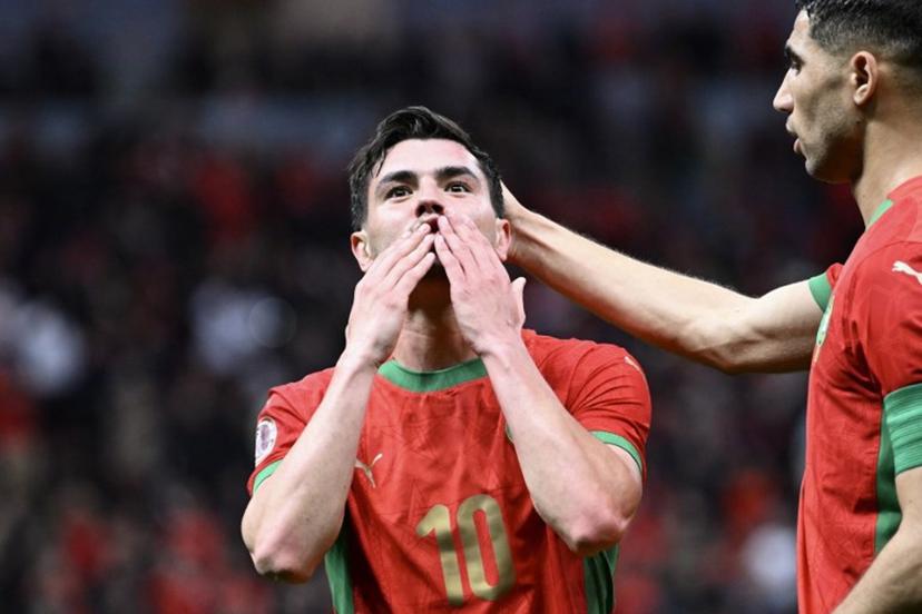 Morocco's forward #10 Brahim Diaz celebrates scoring his team's first goal next to Morocco's defender #02 Achraf Hakimi during the Africa Cup of Nations (CAN) round of 16 football match between Morocco and Tanzania at Prince Moulay Abdallah Stadium in Rabat on January 4, 2026.   SEBASTIEN BOZON / AFP