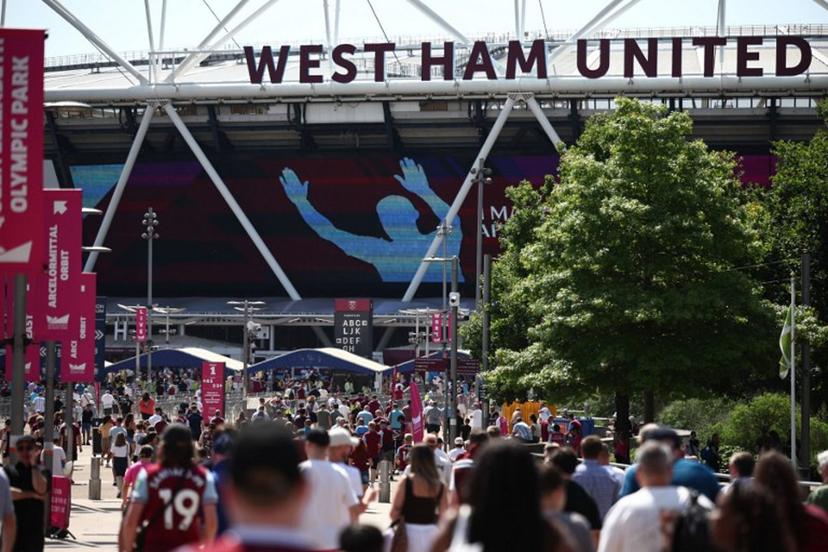 West Ham fans arrive for the English Premier League football match between West Ham United and Leeds United at the London Stadium, in east London on May 24, 2026.  Henry Nicholls / AFP