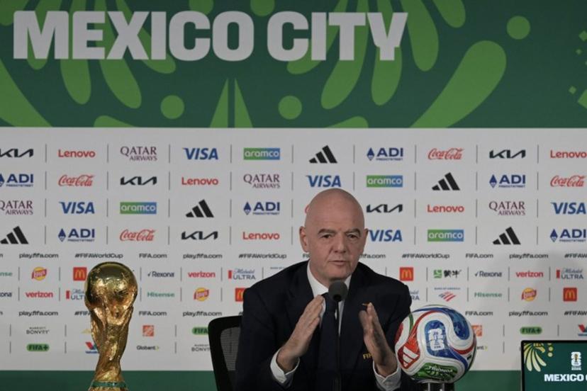 FIFA President Gianni Infantino gives a press conference with the World Cup trophy on the eve of the opening match of the 2026 World Cup football tournament at Mexico city stadium in Mexico City on June 10, 2026.  Alfredo ESTRELLA / AFP