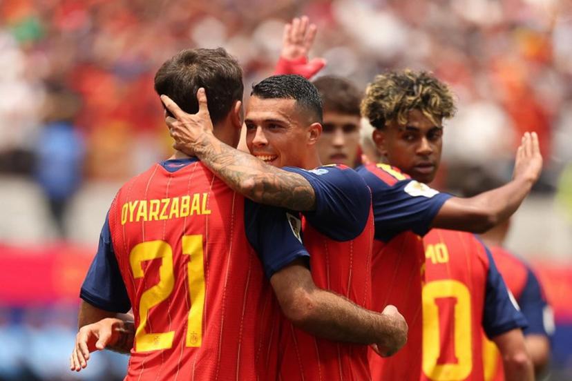 Spain's forward #21 Mikel Oyarzabal (L) celebrates scoring his team's first goal with defender #12 Pedro Porro (C) and forward #19 Lamine Yamal during the 2026 World Cup round of 32 football match between Spain and Austria at the Los Angeles Stadium in Inglewood on July 2, 2026.   ETIENNE LAURENT / AFP