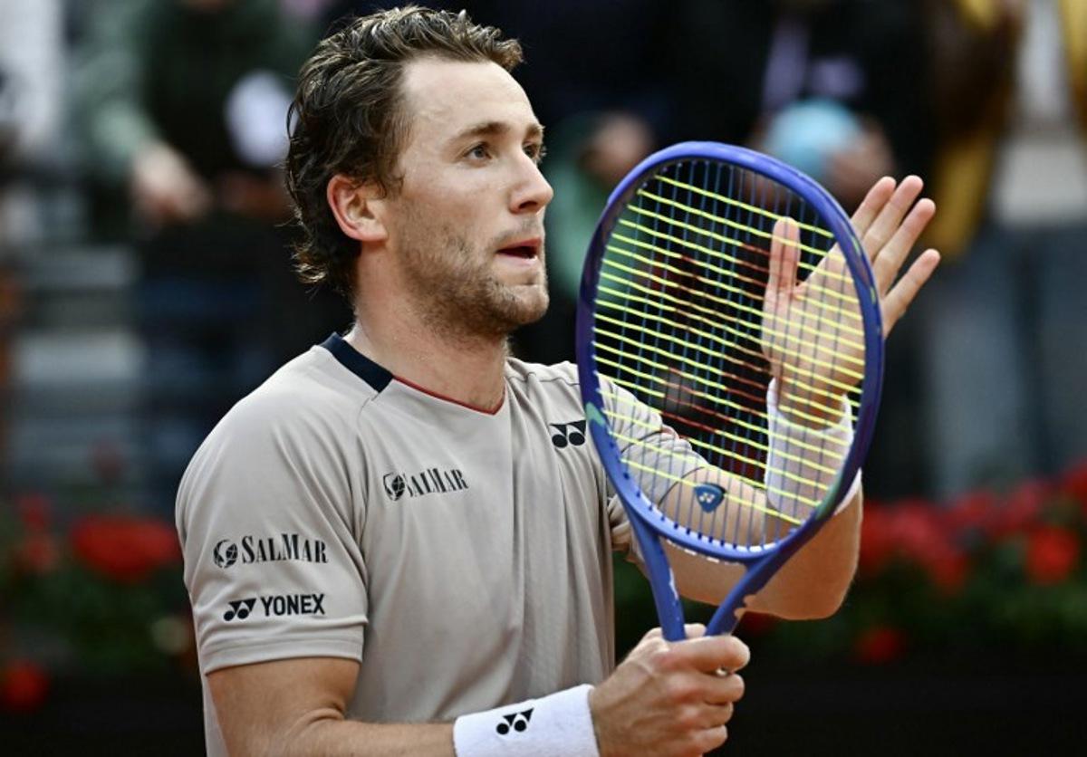 Norway's Casper Ruud celebrates after winning against Russia's Karen Khachanov during the ATP Rome Open tennis tournament at Foro Italico in Rome on May 13, 2026.   Filippo MONTEFORTE / AFP
