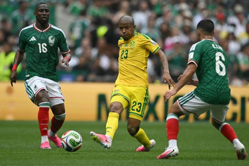 Mexico's forward #16 Julian Quinones, South Africa's midfielder #23 Jayden Adams and Mexico's midfielder #06 Erik Lira during the 2026 World Cup Group A football match between Mexico and South Africa at the Mexico City Stadium in Mexico City on June 11, 2026.  CARL DE SOUZA / AFP